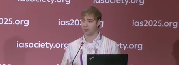 Young man presenting at a conference